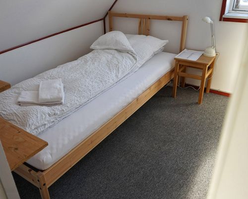 The Red House - Eastgreenland - Unterkunft - Bett